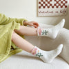 Warme Blumensocken